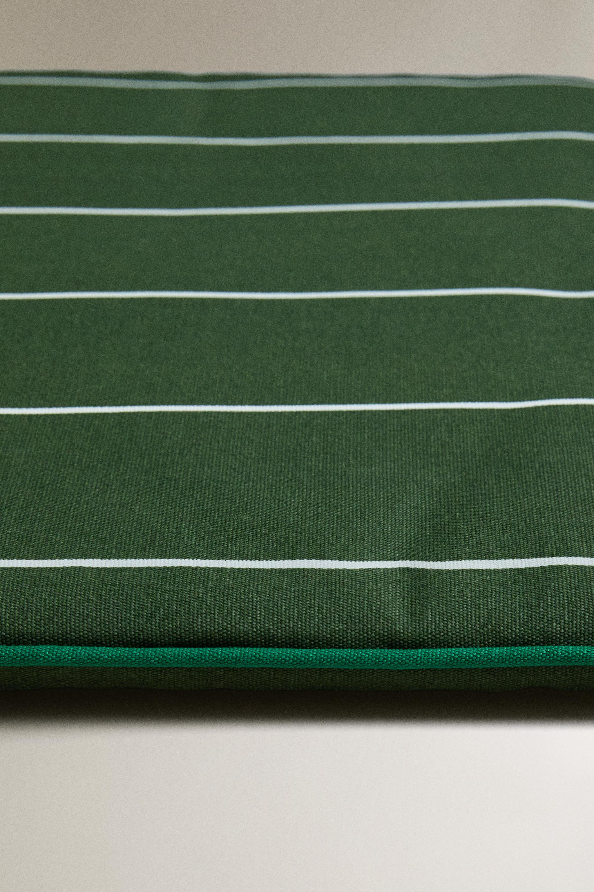 STRIPED TOPPER WITH PIPING